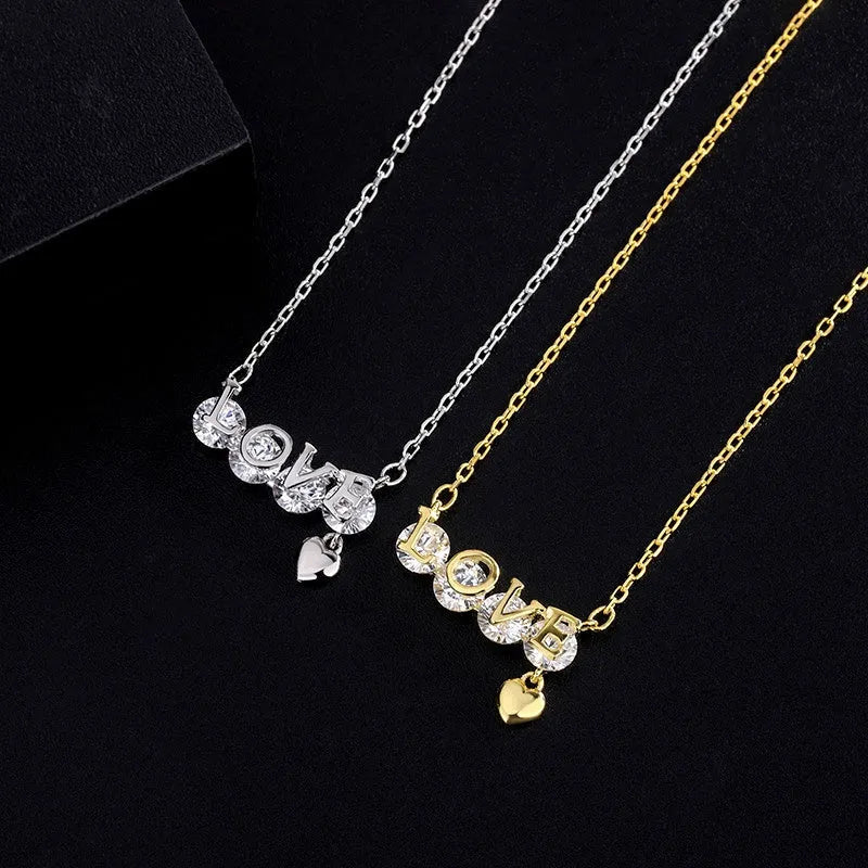 Close-up of the pendant and clasp on the LOVE Letter Necklace