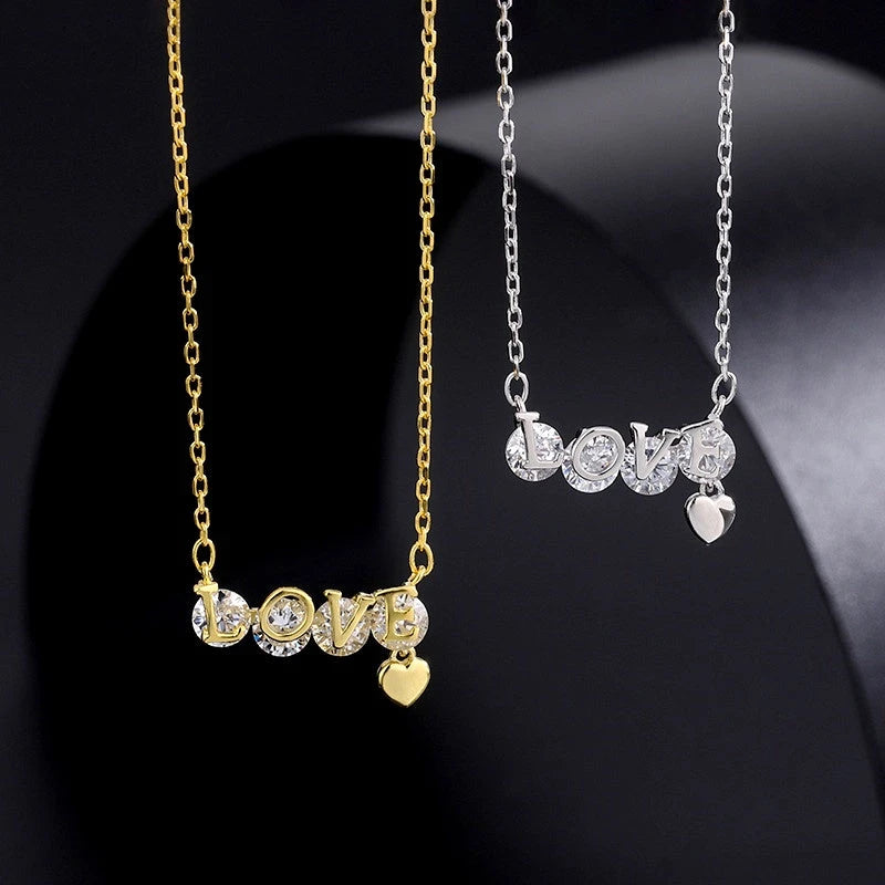 Sterling Silver Zircon Letter LOVE Necklaces worn to showcase its length and pendant detail