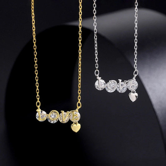 Sterling Silver Zircon Letter LOVE Necklaces worn to showcase its length and pendant detail