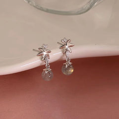 Angled view of the Sterling Silver Zircon Maple Leaf Earrings