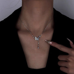 Close-up of the pendant and clasp on the Mother Butterfly Necklace