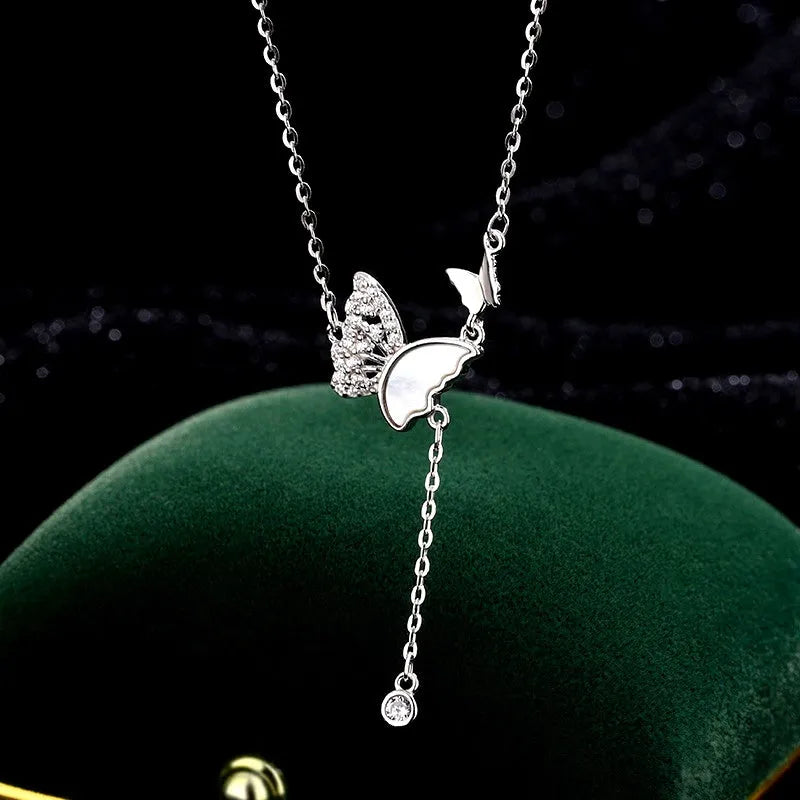 Sterling Silver Zircon Mother And Baby Butterfly Necklace worn to showcase its length and pendant detail