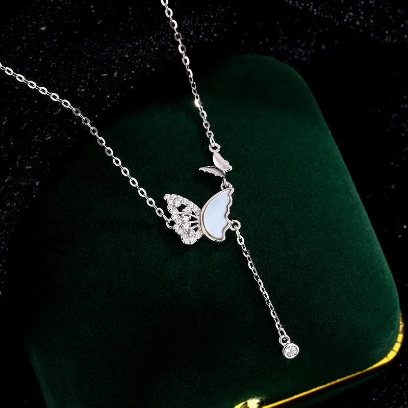 Detailed view of the Sterling Silver Zircon Mother And Baby Butterfly Necklace chain and pendant