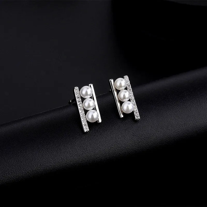 Close-up detail of the sparkling zircons and plating on the Zircon Pearl Studs