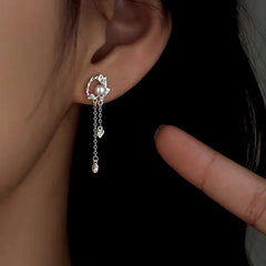 Close-up detail of the sparkling zircons and plating on the Pearl Tassel Earrings