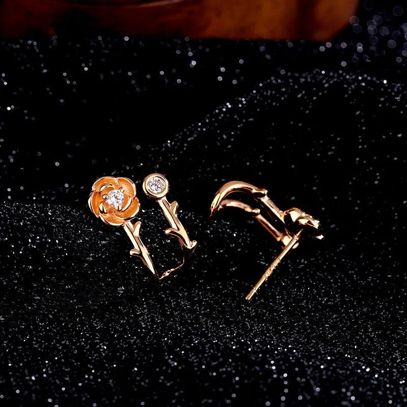 Angled view of the Sterling Silver Zircon Rose Stud Earrings
