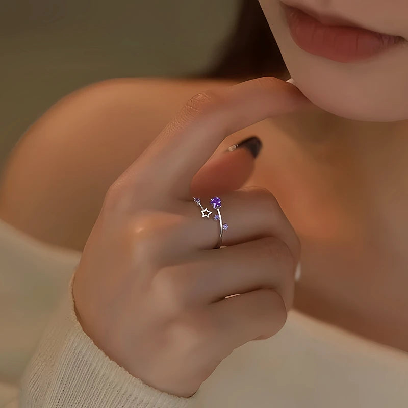 Close-up view of the gemstone and setting of the Zircon Star Ring