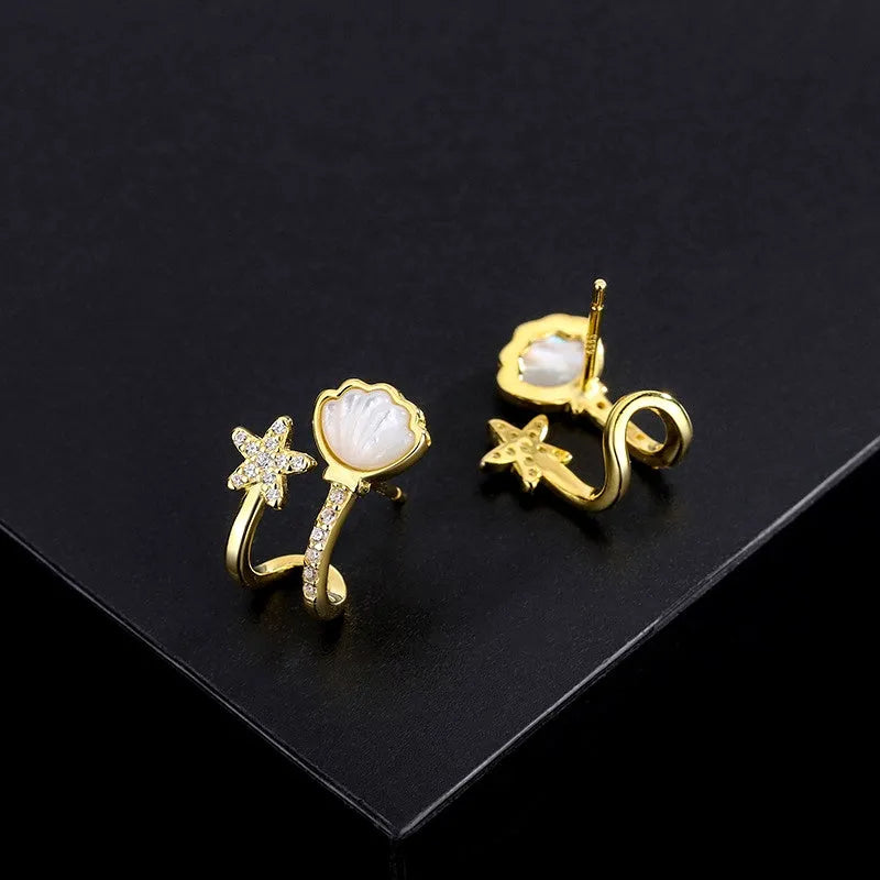 Angled view of the Sterling Silver Zircon Starfish Shell Stud Earrings