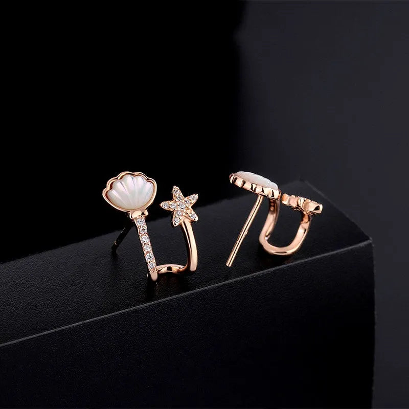 Close-up detail of the sparkling zircons and plating on the Starfish Stud Earrings