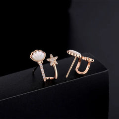 Close-up detail of the sparkling zircons and plating on the Starfish Stud Earrings