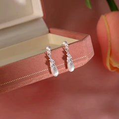 Angled view of the Sterling Silver Zircon Water Drop Earrings