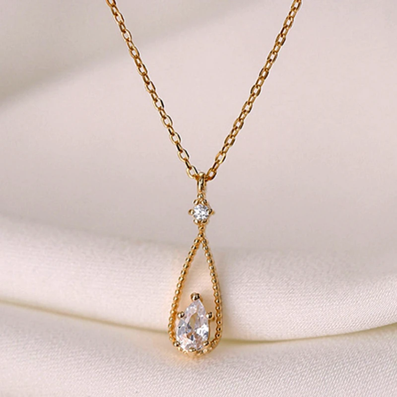 Sterling Silver Zircon Water Drop Necklace worn to showcase its length and pendant detail