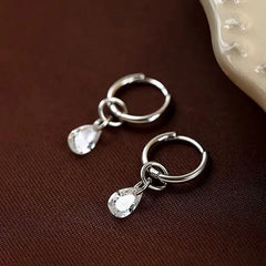 Close-up detail of the sparkling zircons and plating on the Tassel Drop Earrings