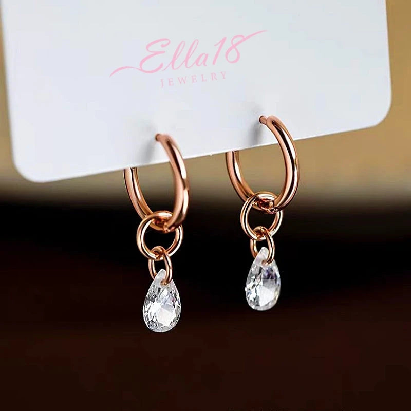 Angled view of the Sterling Silver Zircon Water Drop Tassel Earrings