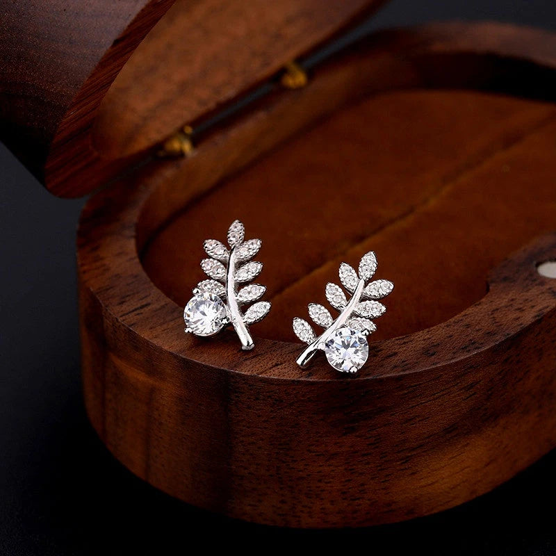 Close-up detail of the sparkling zircons and plating on the Wheat Stud Earrings