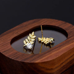 Angled view of the Sterling Silver Zircon Wheat Stud Earrings