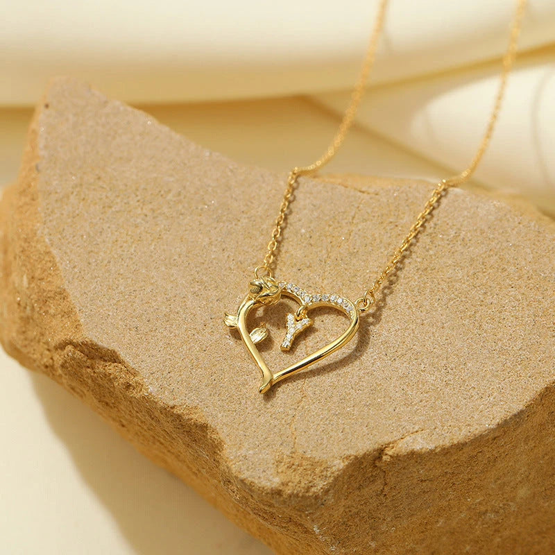 Close-up of the pendant and clasp on the Letter Necklace