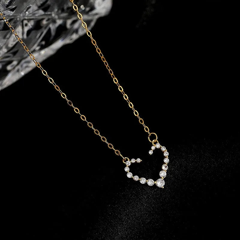Detailed view of the Sterling Silver Luxury Diamond Hollow Heart Necklace chain and pendant