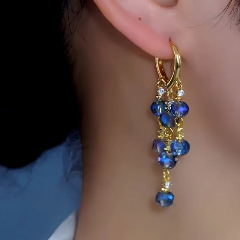 Close-up detail of the sparkling zircons and plating on the Crystal Tassel Earrings