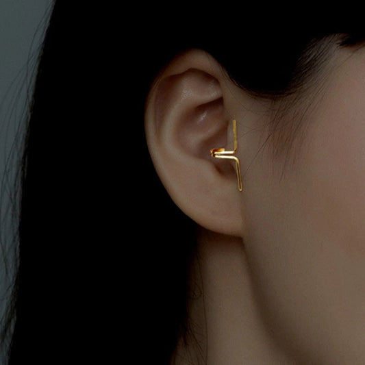 Model showcasing the dangle and style of the Sterling Silver Cross-Border Ear Clips ( 1 Pair )