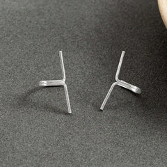 Angled view of the Sterling Silver Cross-Border Ear Clips ( 1 Pair )
