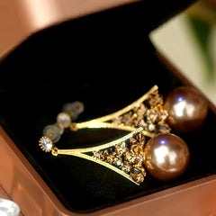 Close-up detail of the sparkling zircons and plating on the Pearl Threader Earrings