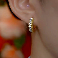 Close-up detail of the sparkling zircons and plating on the Exquisite Zircon Hoop Earrings
