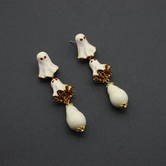 Close-up detail of the sparkling zircons and plating on the Ghost Earrings