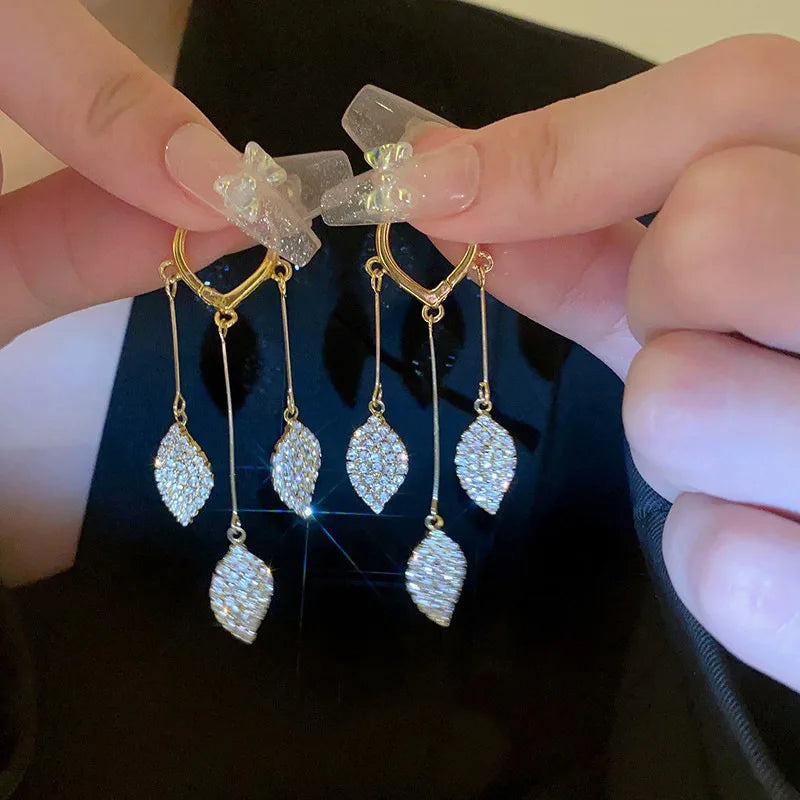 Pair of Gold Heart Hoop Dangle Earrings with Paved Crystal Leaf Drops