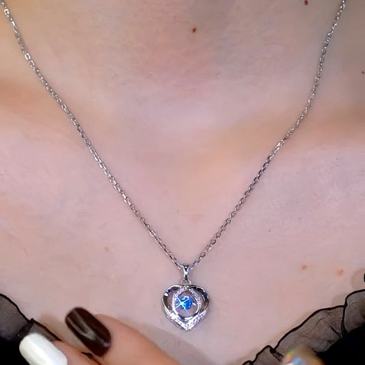 Sterling Silver Luxury Dynamic Heart Necklace worn to showcase its length and pendant detail