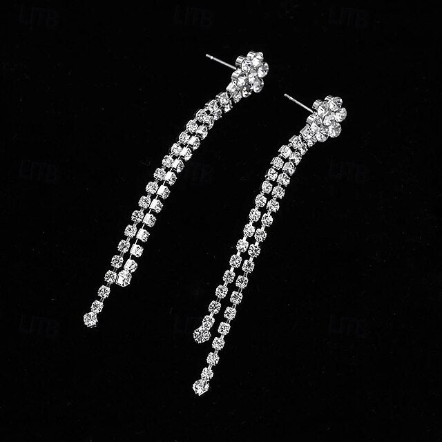 Long dangling silver rhinestone drop earrings with clustered crystal top