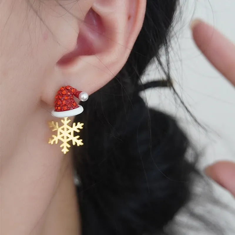 Angled view of the 14K Gold Plated Christmas Asymmetrical Snowflake Earrings